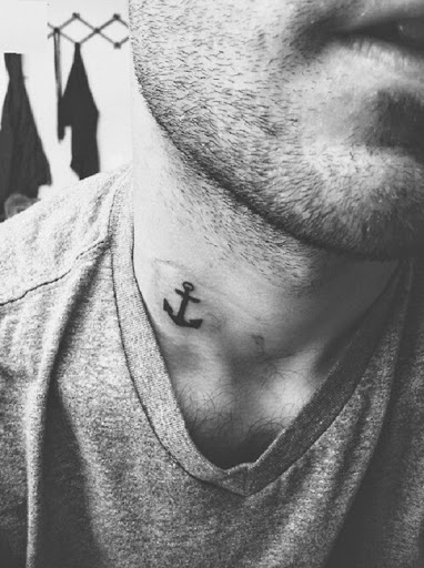 small anchor tattoo on neck