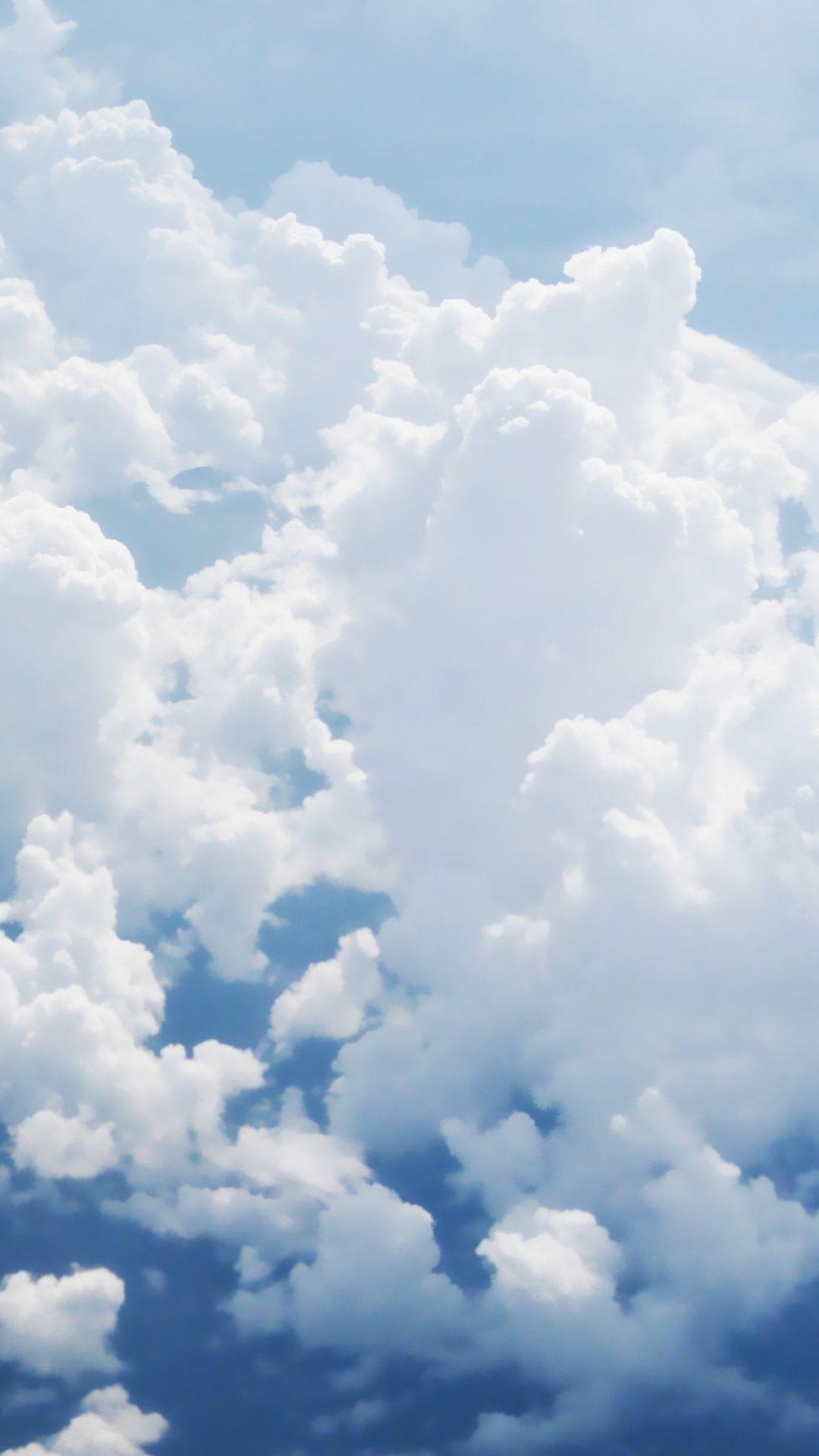 Puffy White Clouds iPhone 6 wallpaper