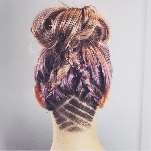 messy-braids-and-bun-hairstyle-with-shaved-nape-design